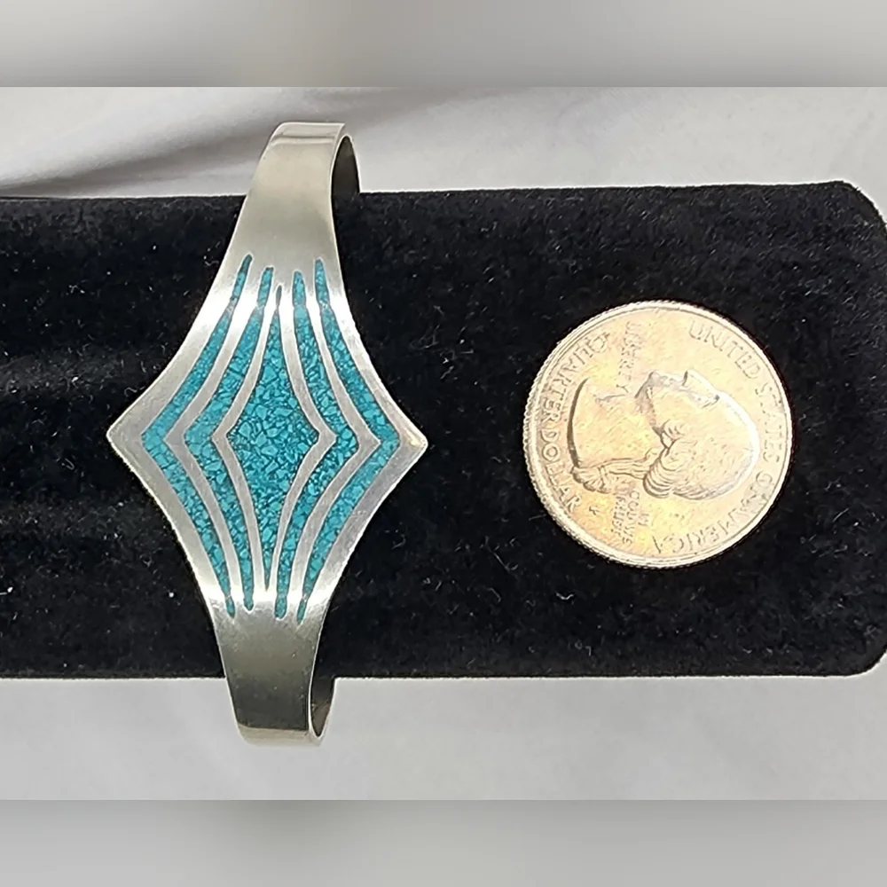 Vintage Sterling Silver Taxco Cuff Bracelet with turquoise inlay.